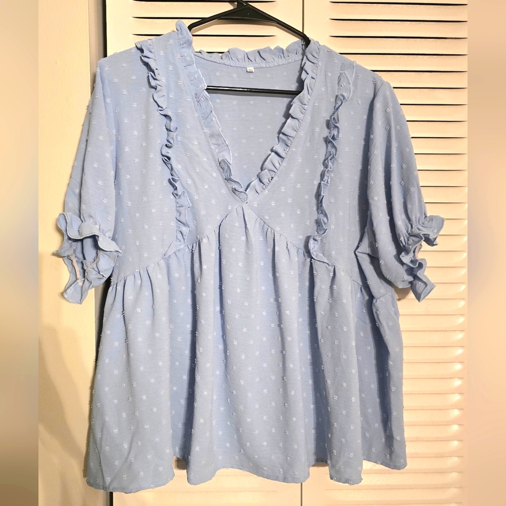 Elegant Blue Blouse with Delicate Details
